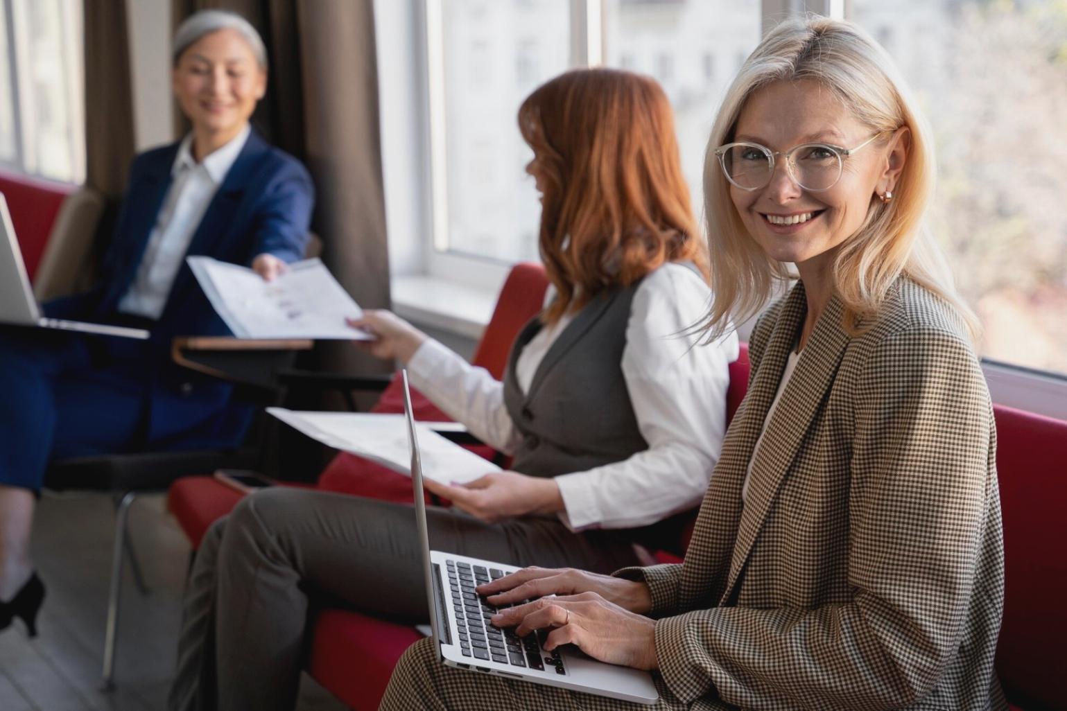 Finance professionals reviewing corporate analysis reports